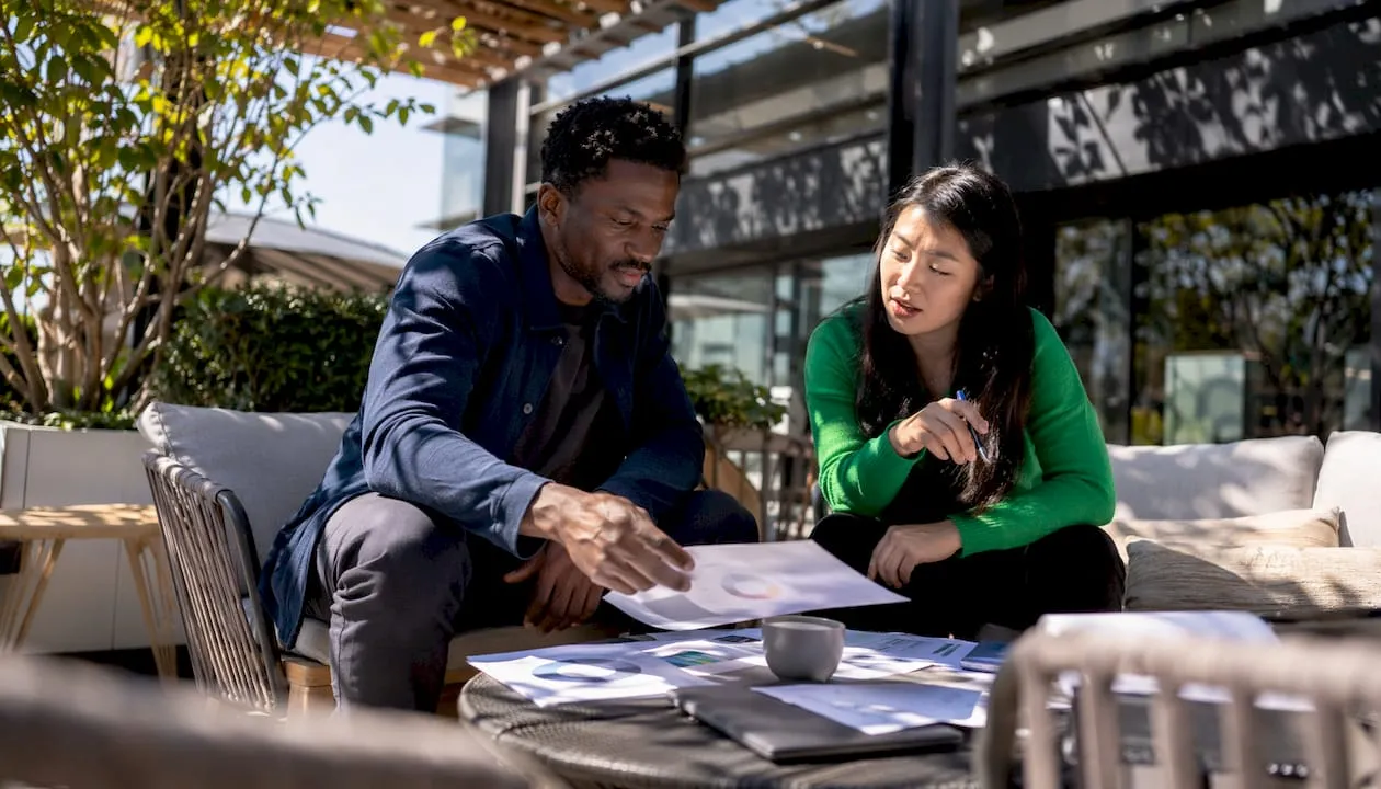 Marketing team discussing AI content benefits
