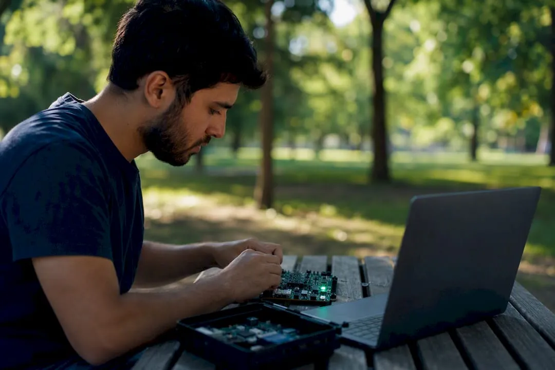 Hands assembling tech components symbolizing product schema