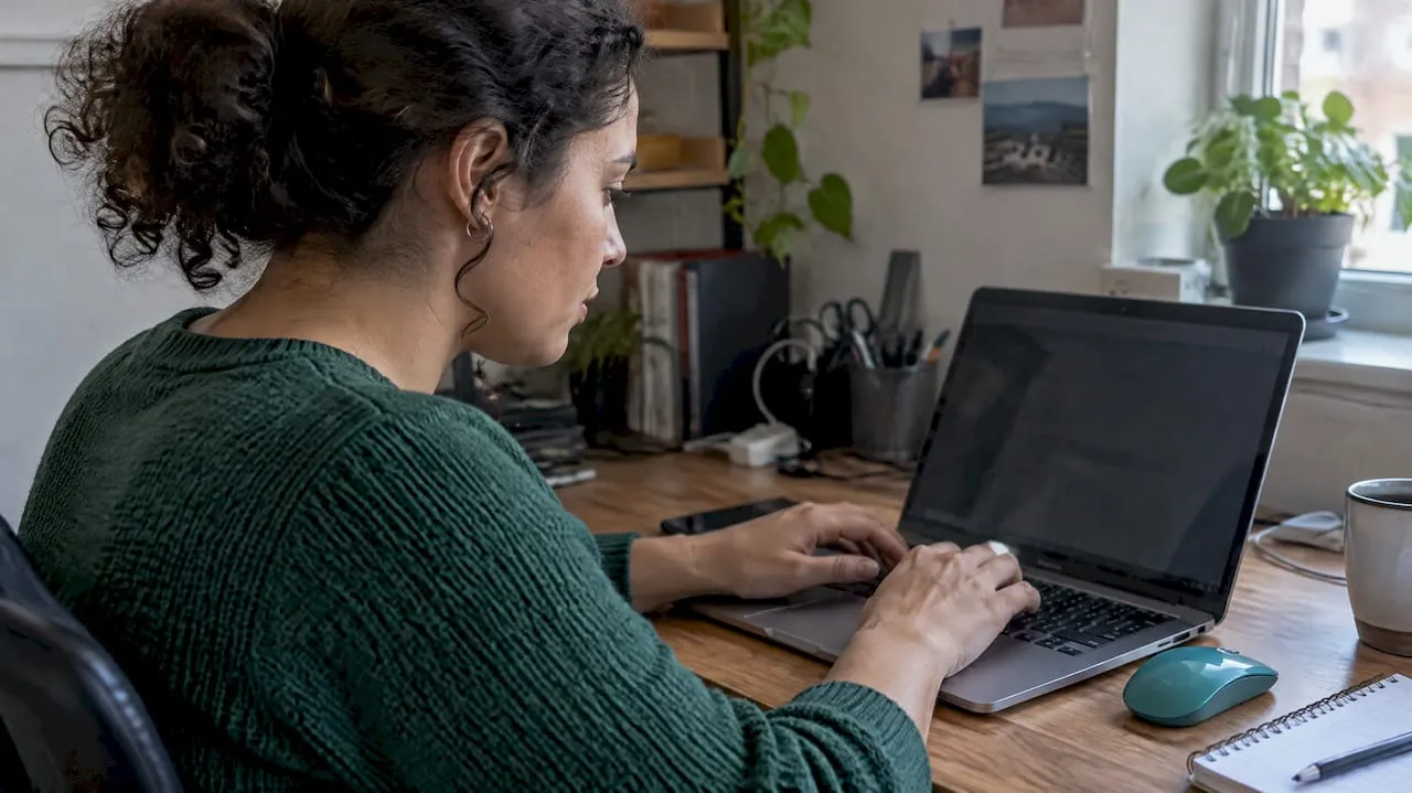 Seller revising a product title on laptop